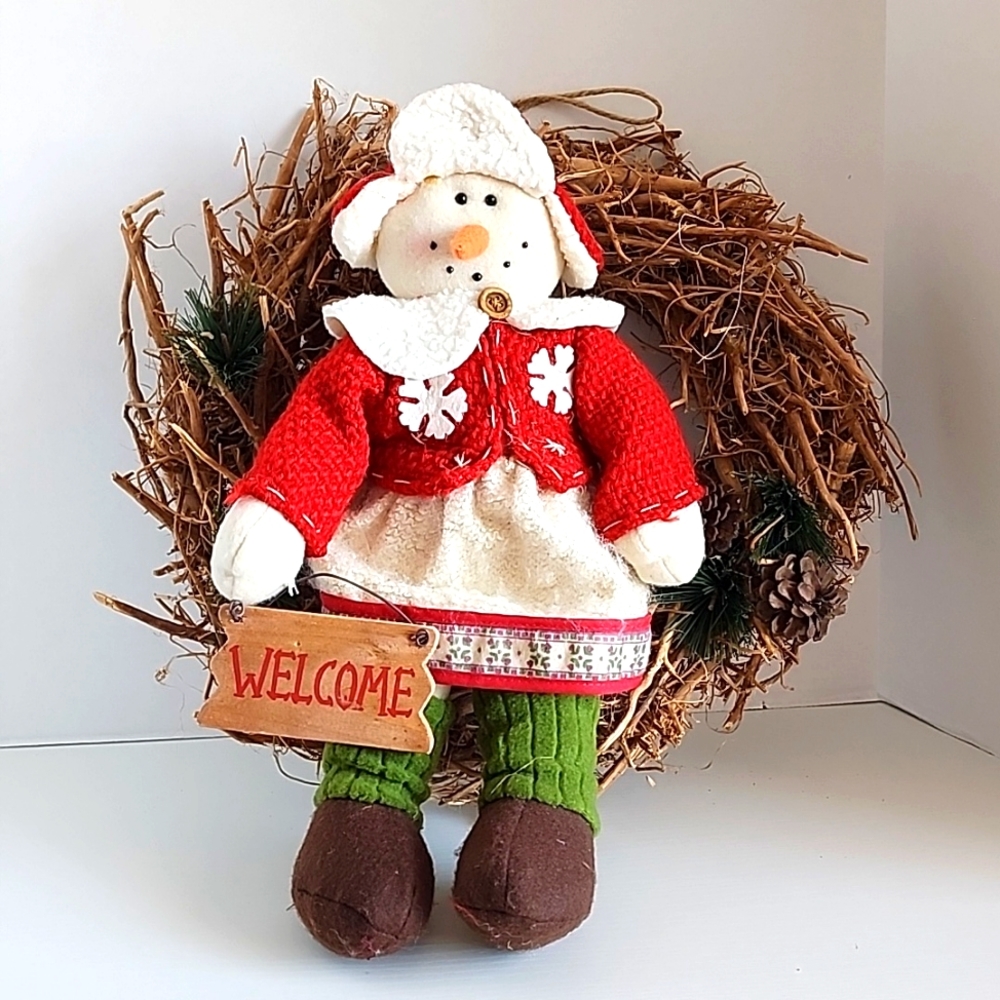 WREATH Snowman plush on a bed of twigs tree branches wreath